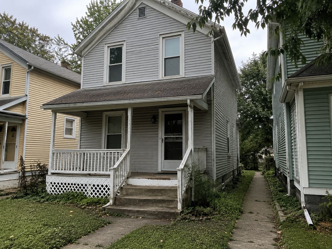 An older two-story Kansas City home from the galvanized-plumbing era