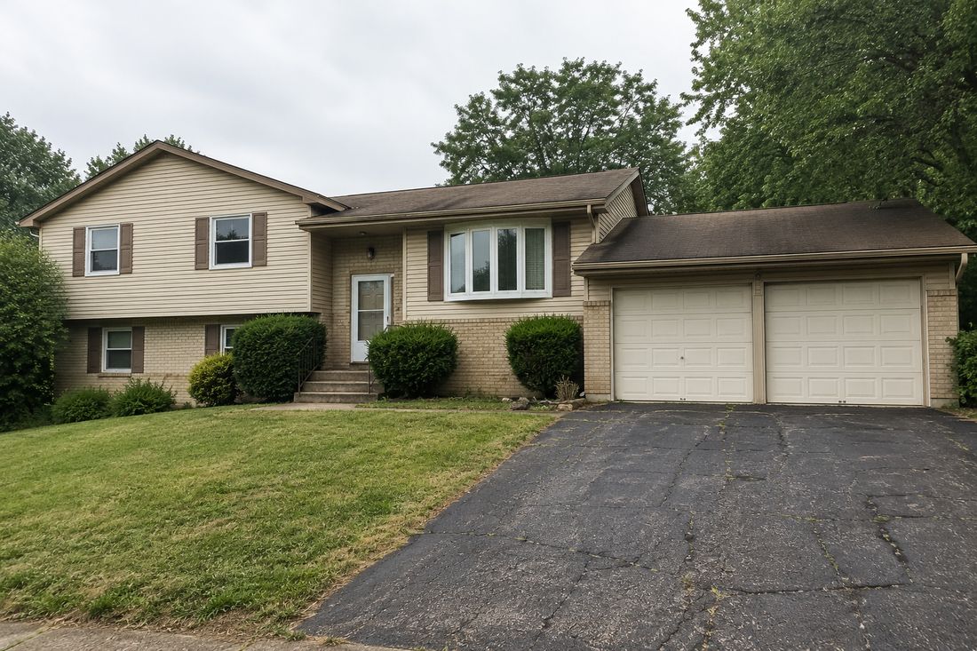 A split-level home with a two-car garage